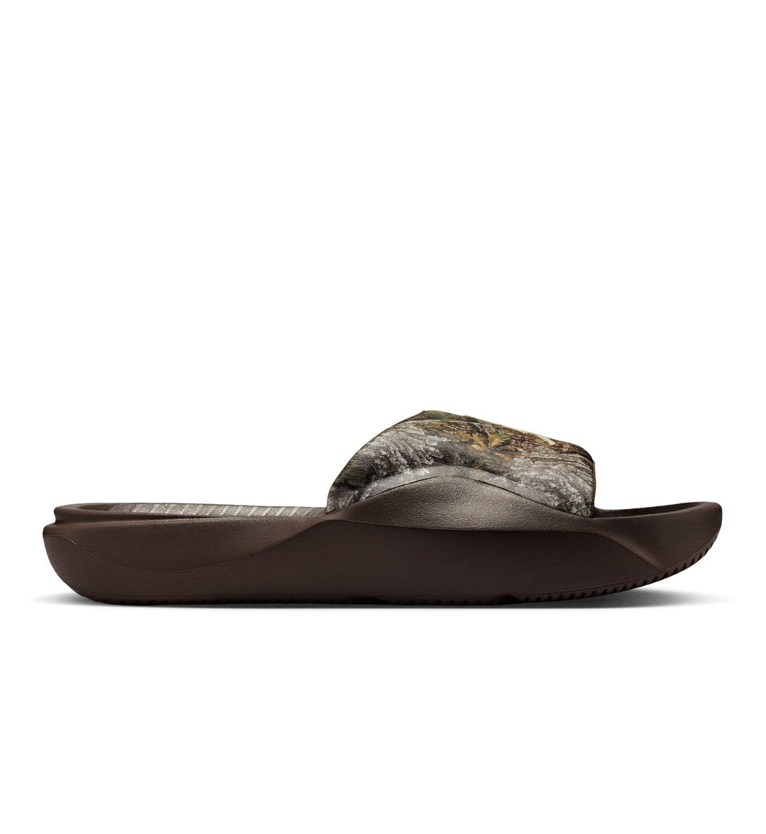 A brown Jordan Franchise Slide with a camouflage-patterned strap against a white background