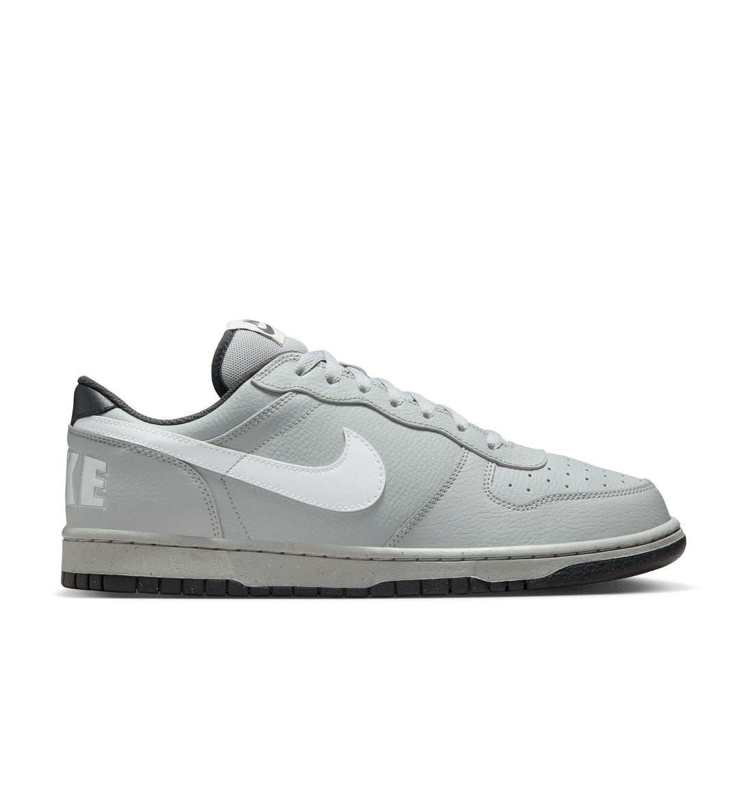 Gray sneaker with a white Nike logo on a white background
