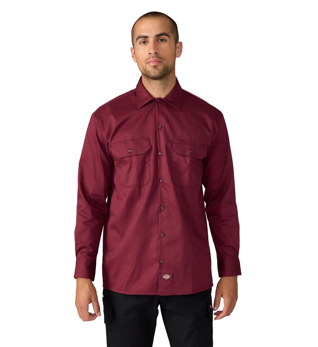 Man wearing a burgundy Dickies Long Sleeve Work Shirt on a white background