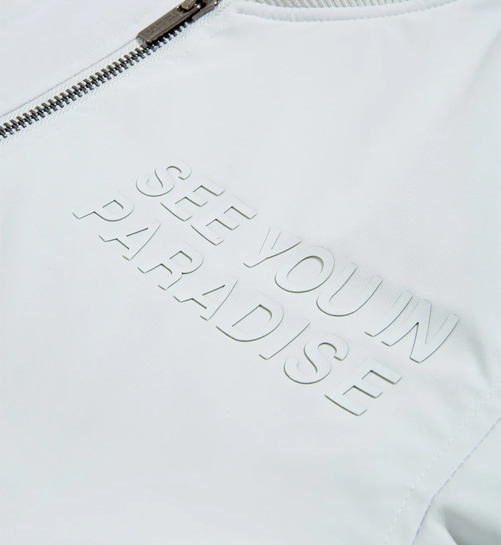 Detail of Cruel Intentions Bomber Jacket — Light Grey 'SEE YOU IN PARADISE' text 