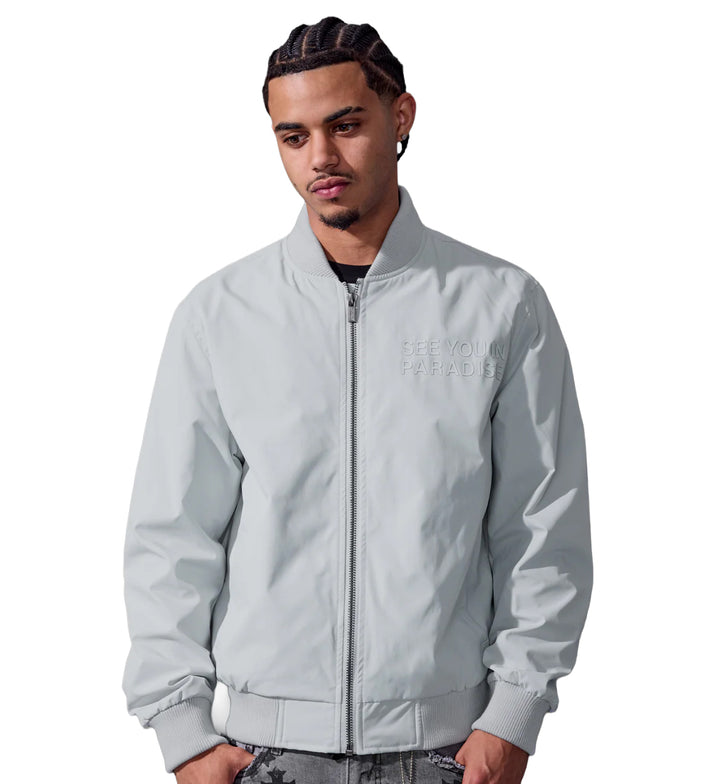 Man wearing See You In Paradise Cruel Intentions Bomber Jacket — Light Grey with a brand logo on a white background