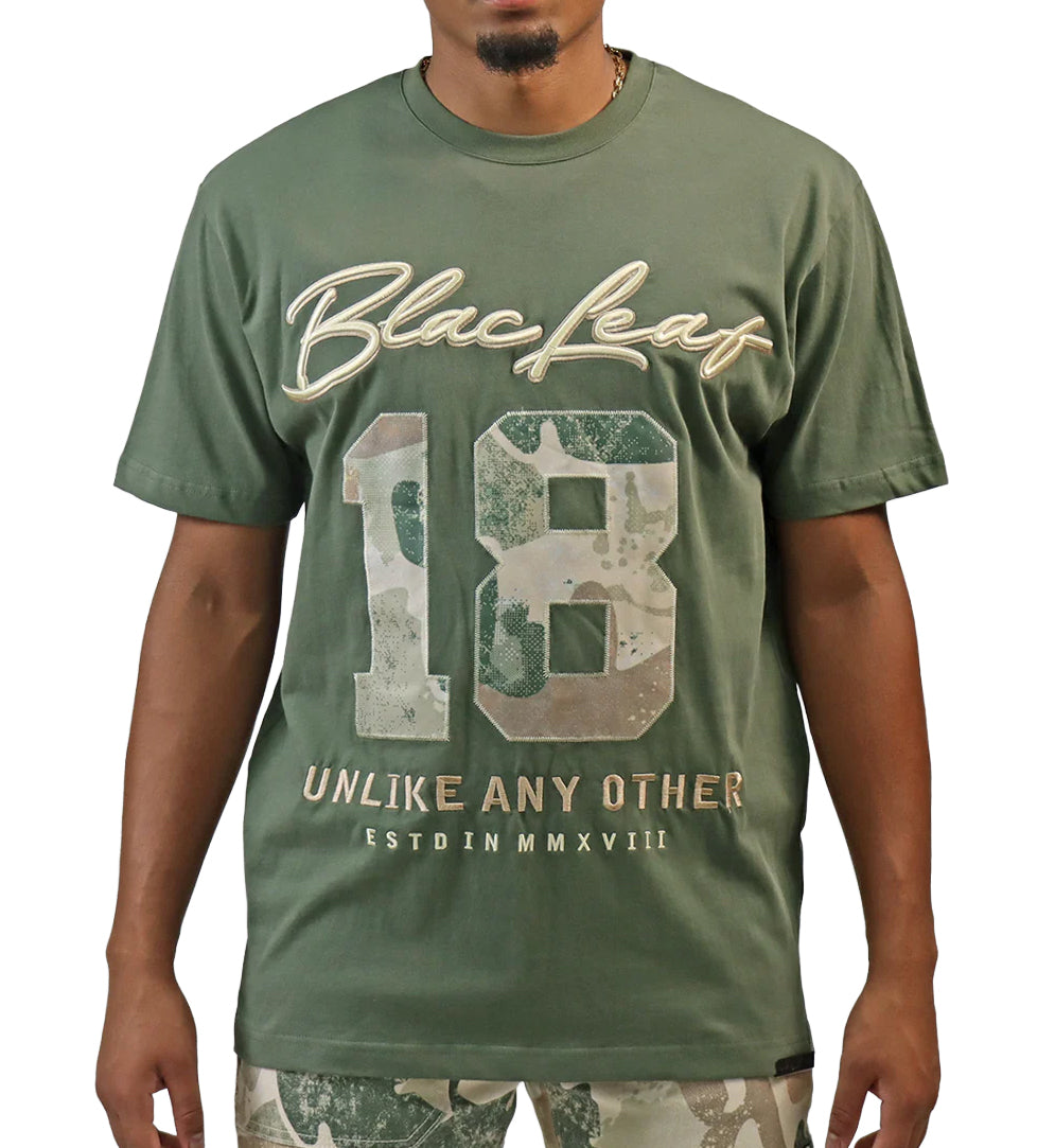 Person wearing Blac Leaf Purpose Above All T-Shirt “Military Olive”