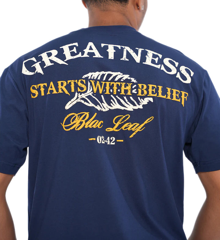 Person wearing Blac Leaf Greatness Starts With Belief T-Shirt “Navy” viewed from the back