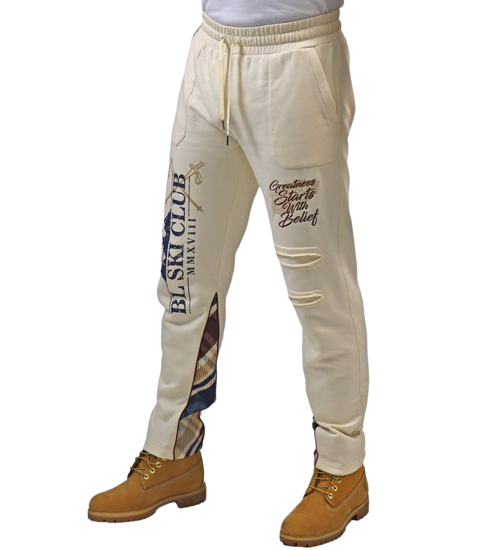 Man wearing Blac Leaf Greatness Starts With Belief Jogger “Cream/Plaid”