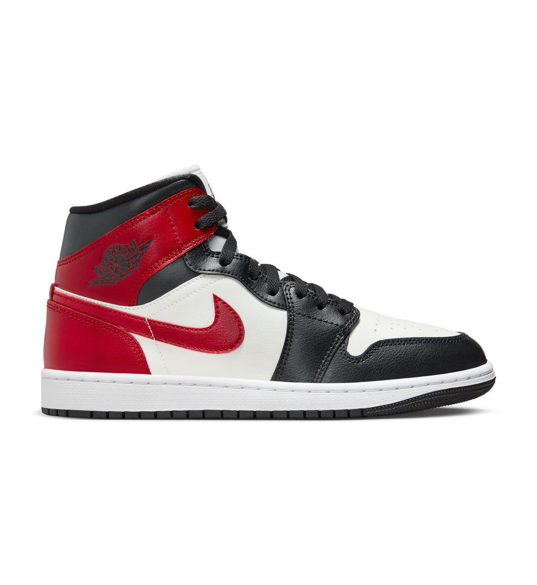 Black, red, and white Air Jordan 1 Mid Women’s “Black Toe” sneaker with Nike lswoosh on a white background