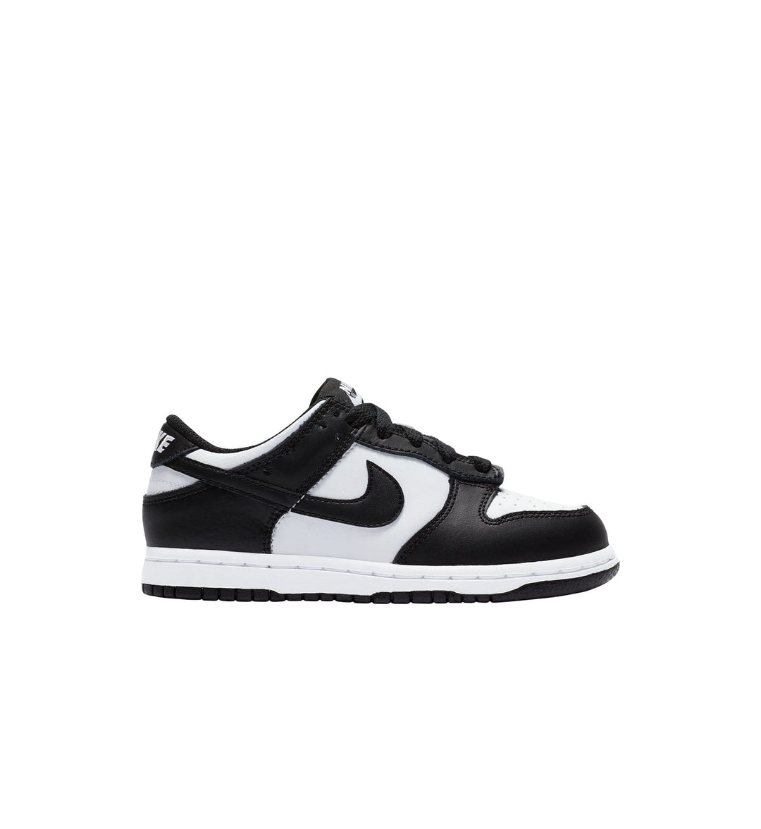 Black and white Nike Dunk preschool sneaker with Nike logo on a white background