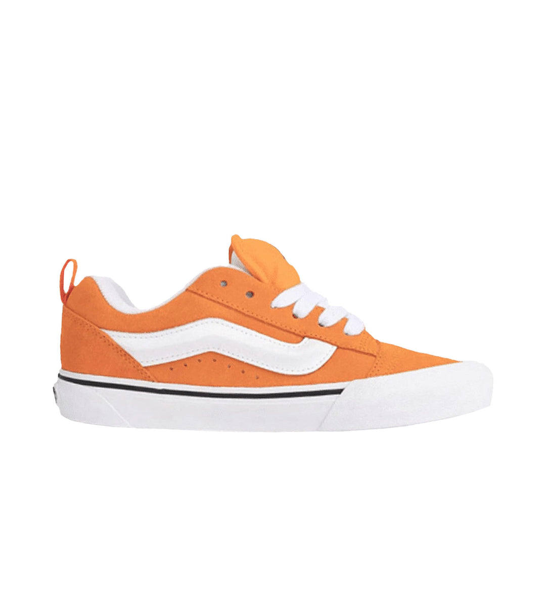 Orange and white Vans Knu Skool sneaker on a white background