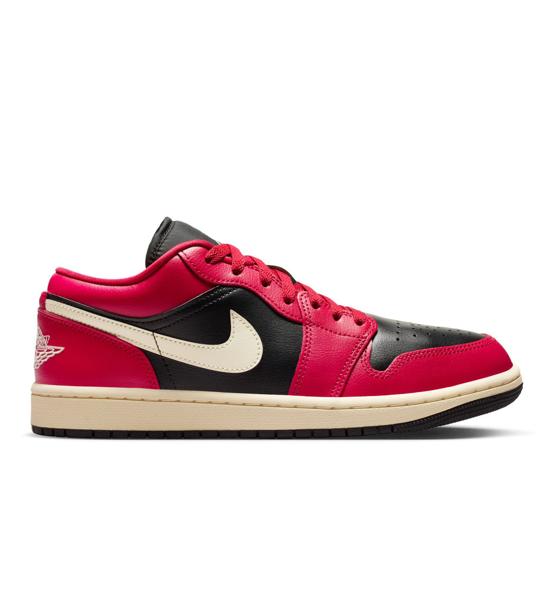 Hot pink, black, and sail Air Jordan Retro 1 Low sneaker against a white background