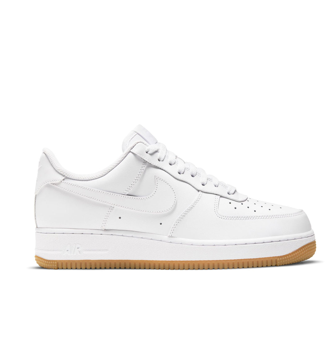 White sneaker with a brown sole on a white background