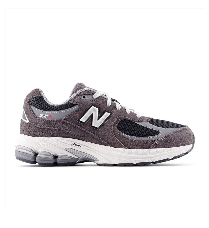 Gray New Balance 2002 GS sneaker on a white background