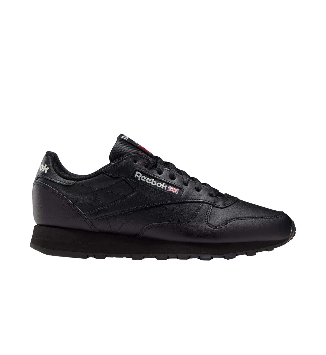 Solid black Reebok Classic Leather shoe on white background.