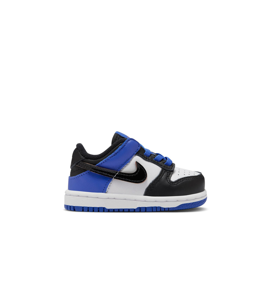 Black, white, and blue Nike Dunk Low toddler sneaker on a white background