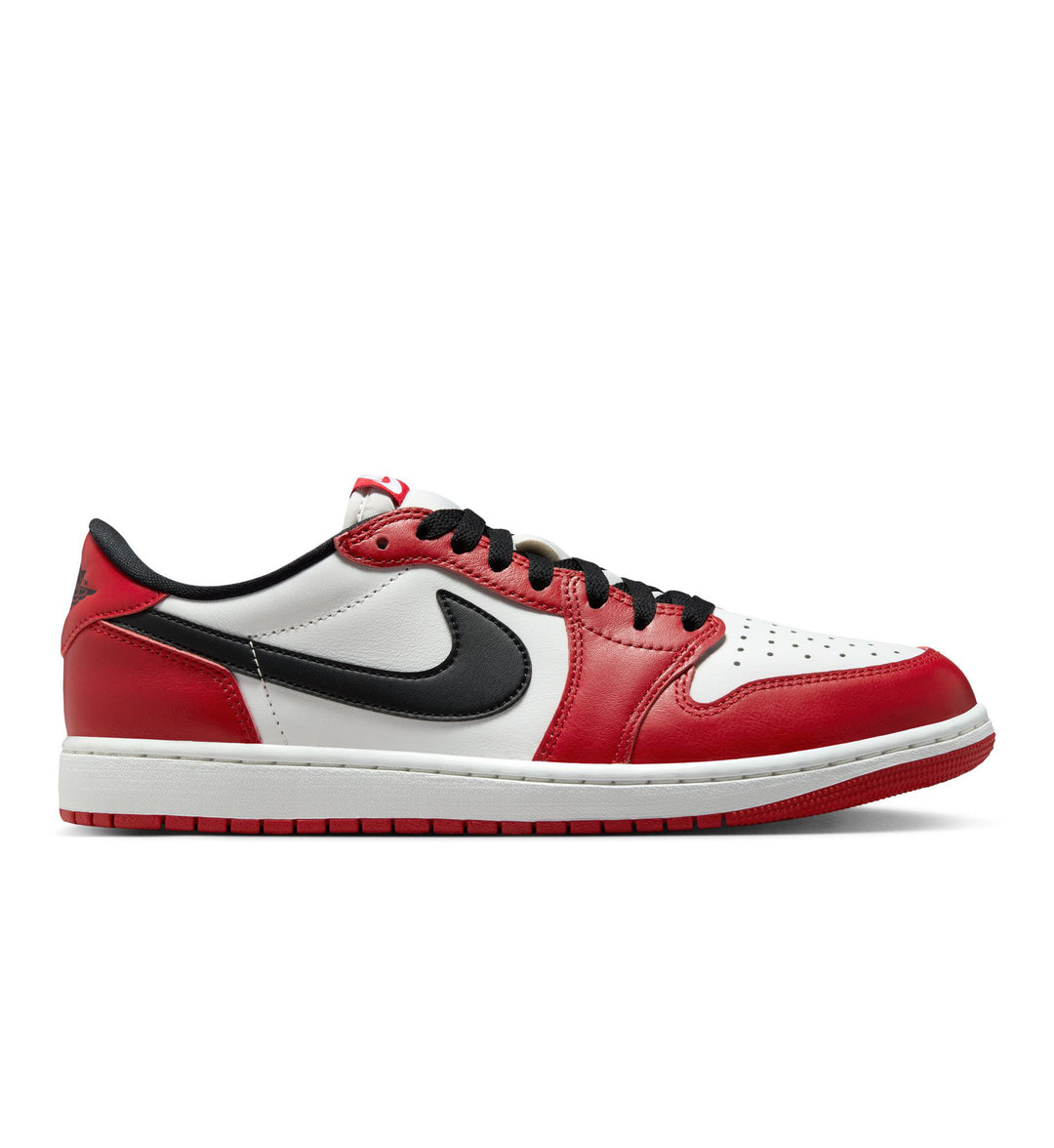 Red, white, and black Air Jordan 1 Low OG shoe on white background