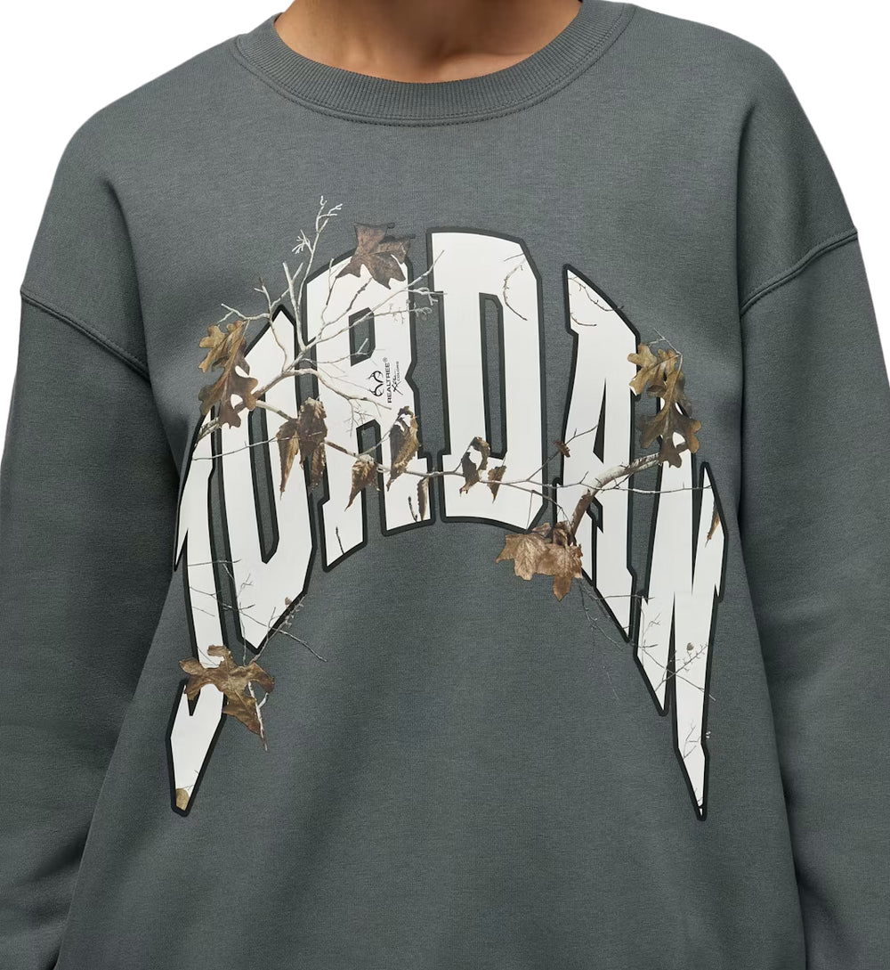 Gray Jordan Brooklyn Fleece Women’s Realtree Crew-Neck Sweatshirt with 'Jordan' graphic design on a plain background