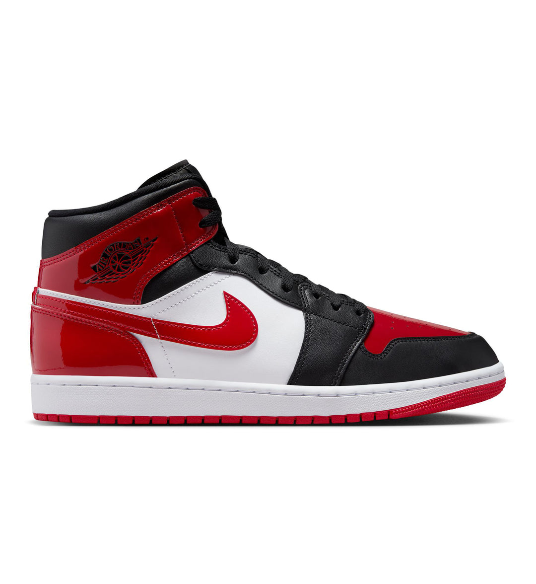 Black, red, and white Air Jordan 1 Mid SE on white background