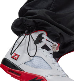 Jordan Brooklyn Men’s Draft Pants “Black/Gym Red/Gym Red” (IB1047-010)