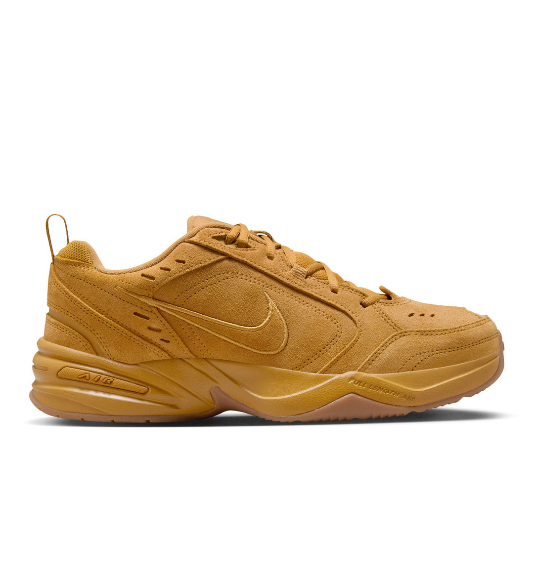 Wheat Nike Air Monarch IV on white background