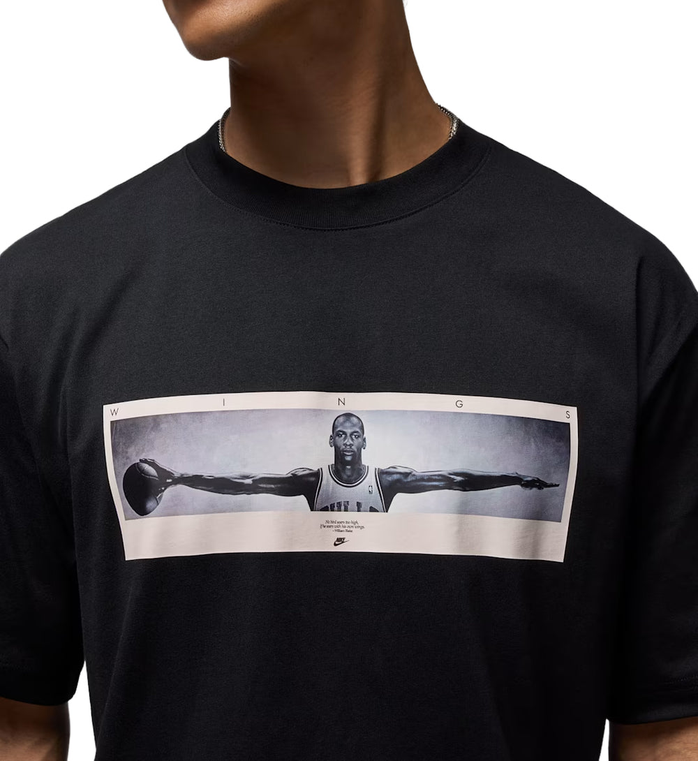 Black Jordan Photo t-shirt with graphic design of a person in a pose on a white background