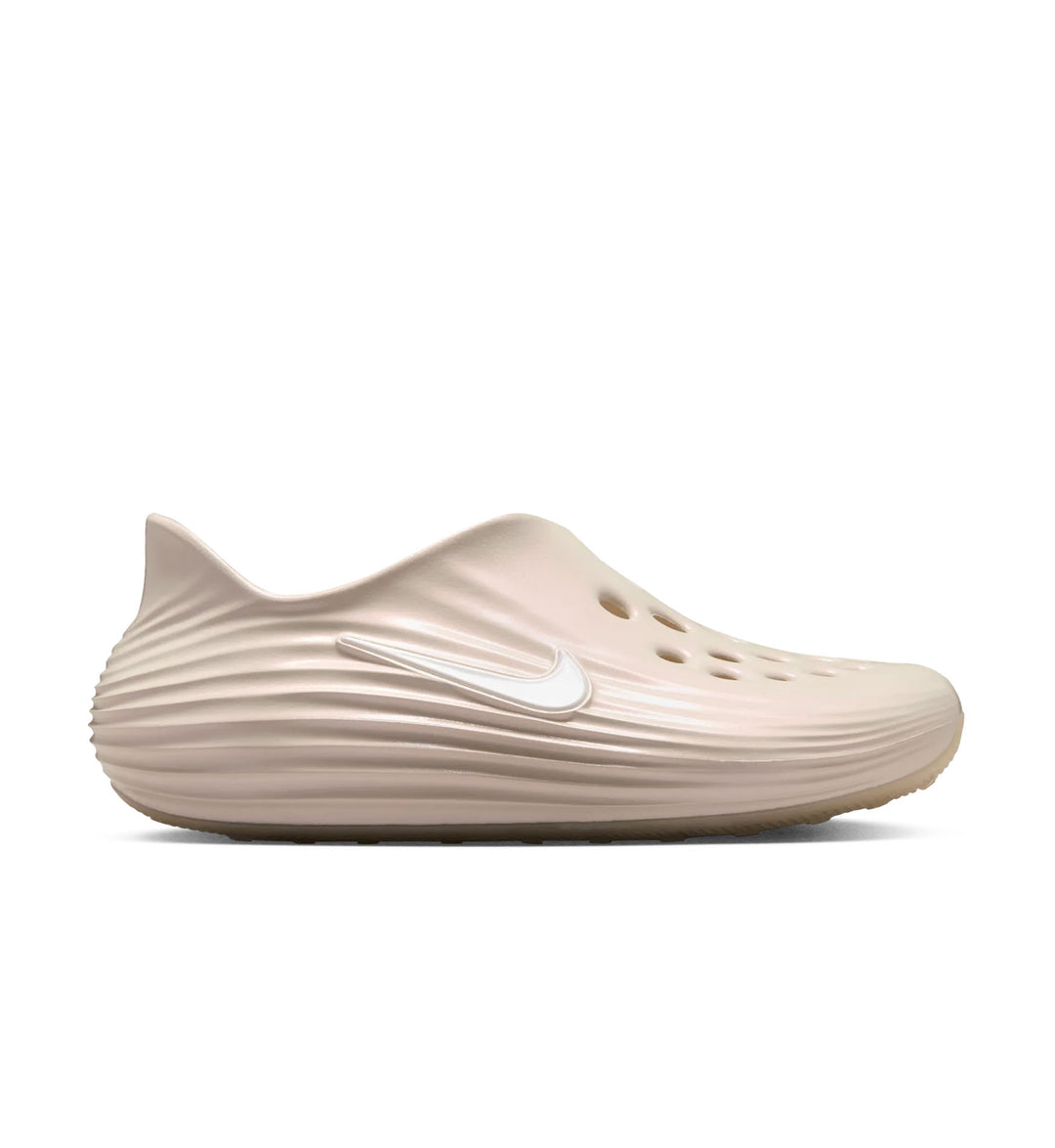 Desert sand Nike A’One ReactX Rejuven8 Women’s foam slide.