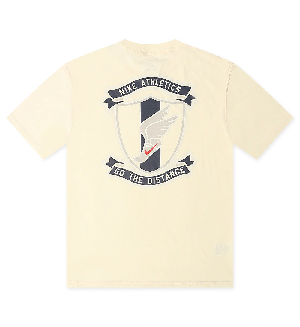 Beige Nike Max90 T-shirt with Nike Athletics logo and text on a white background