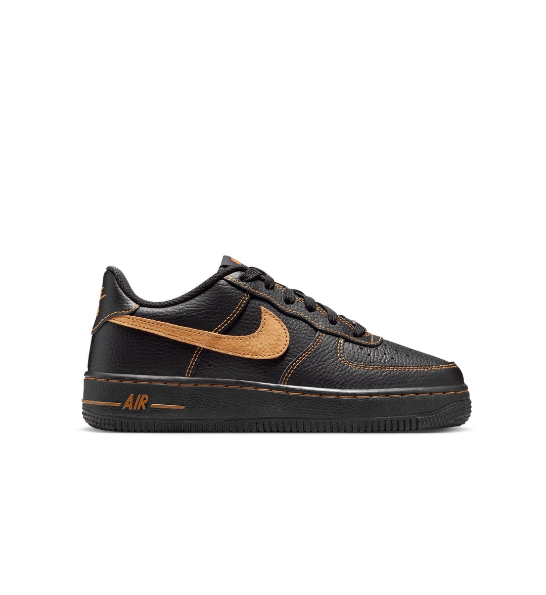 Black Nike Air Force 1 sneaker with wheat swoosh logo on a white background
