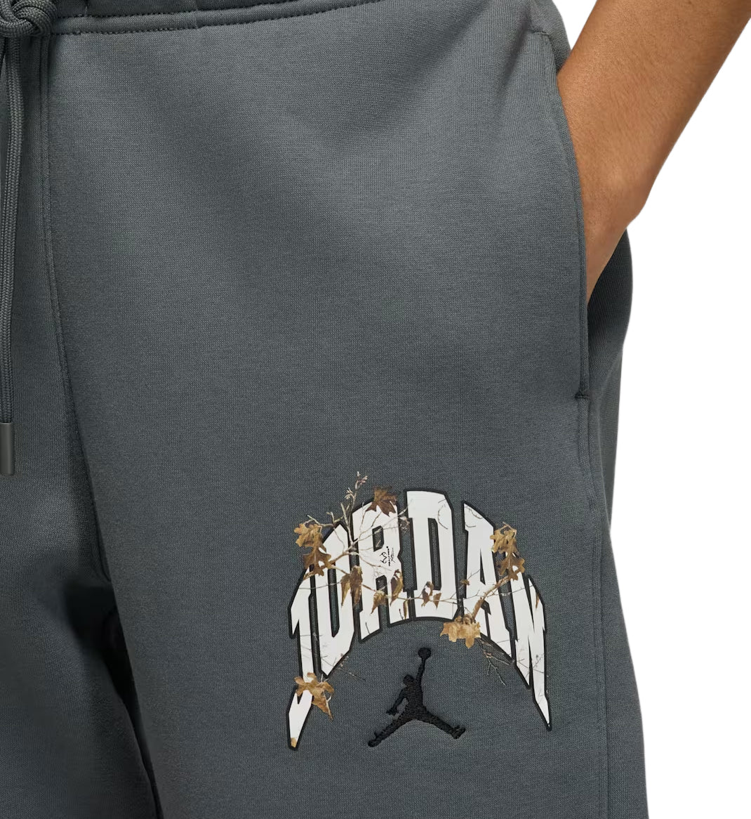 Gray Jordan Brooklyn Fleece Women’s Realtree Pant with Jordan logo and floral design on a white background