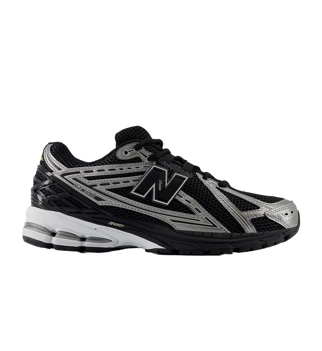 Black and gray running shoe with New Balance logo on a white background