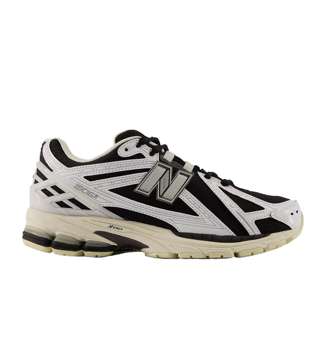 Black and white sneaker with New Balance logo on a white background