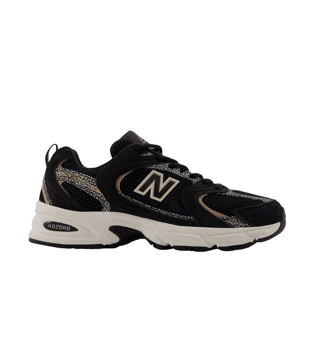Black and leopard print New Balance 530 on white background