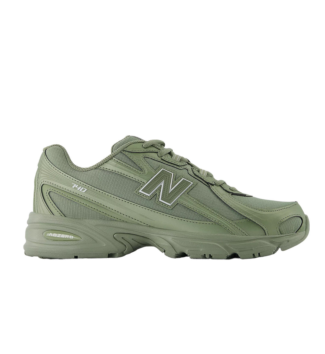 Green New Balance 740 shoe on a white background