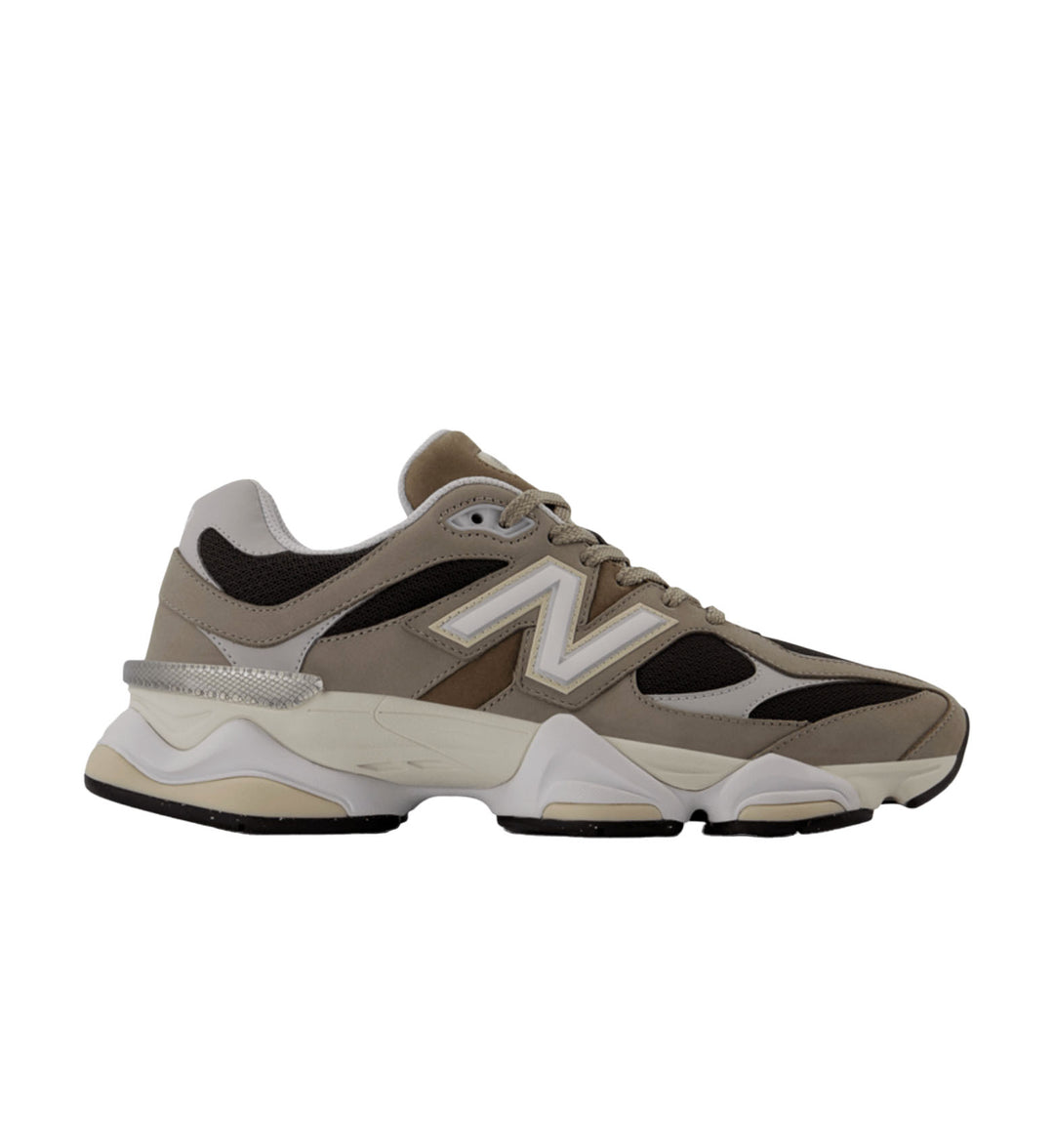 Brown and beige sneaker with New Balance logo on a white background