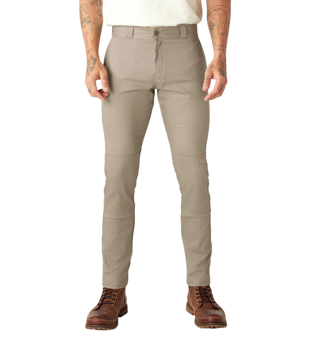 Khaki Dickies FLEX Skinny Fit Double Knee Work Pants worn by a person on a white background