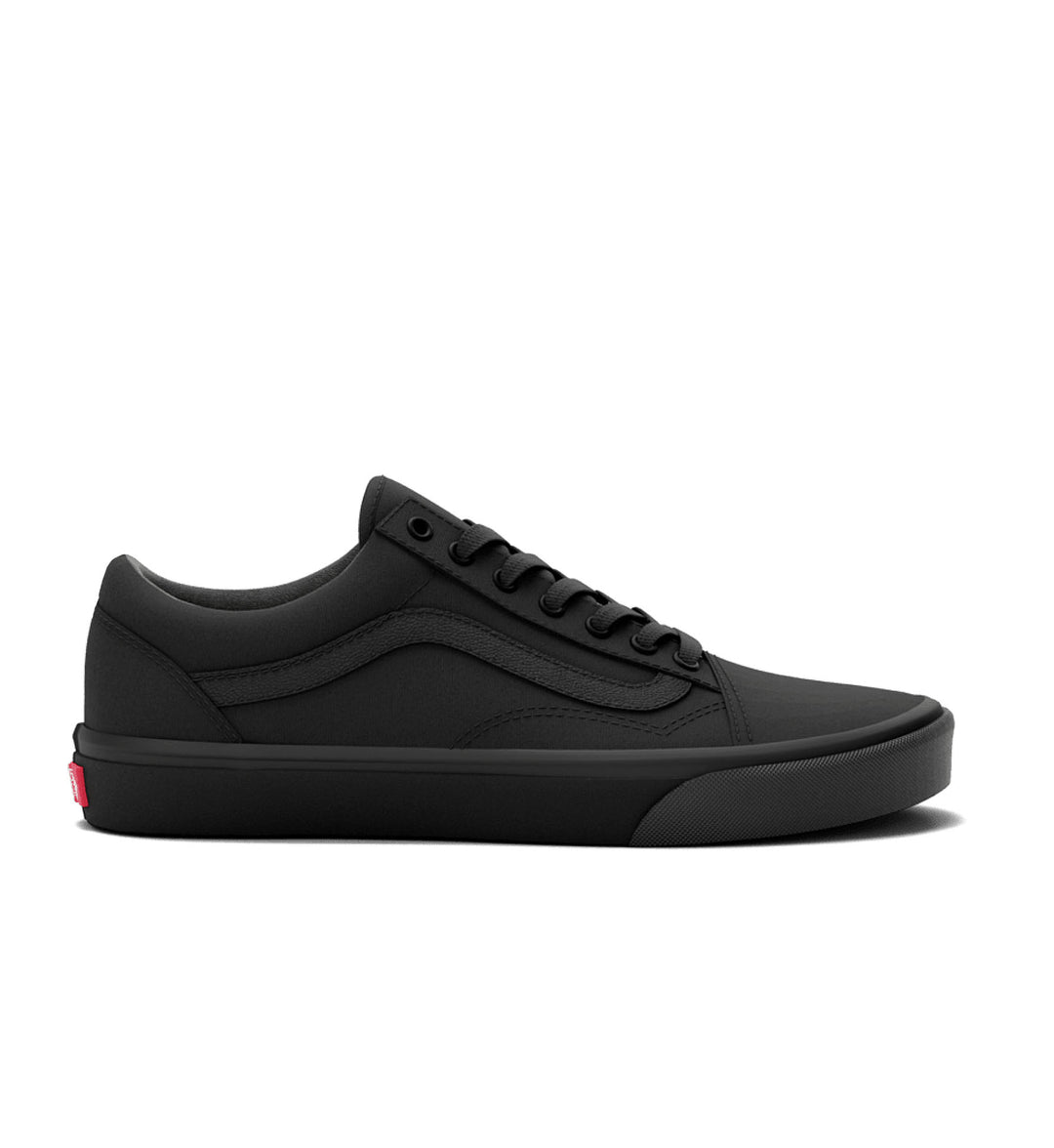 Black Vans sneaker on a white background